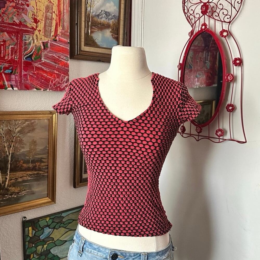 out pink black patterned short sleeve shirt